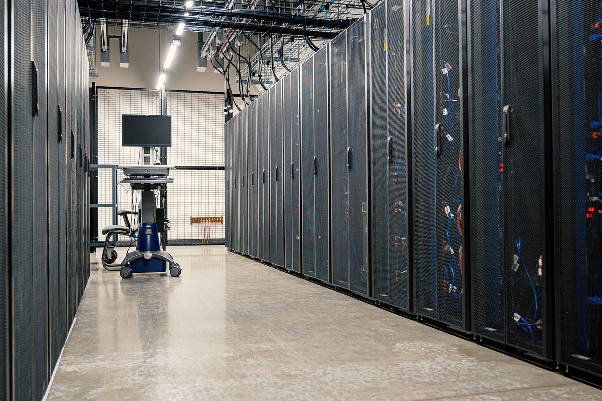 Rows of server racks in a data center